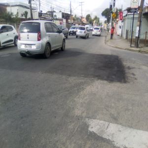 Buraco fechado com matéria de péssima qualidade (Antes e Depois)