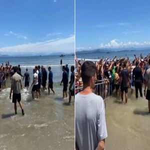 Eduardo Bolsonaro aproveita aglomeração em torno do pai, em praia de SC